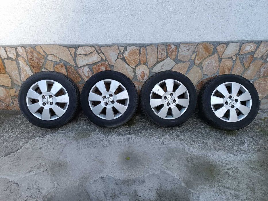 Алуминиеви джанти със зимни гуми за Опел 15" 4х100 мерива, астра и др.