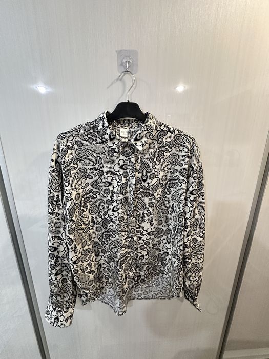 Cămașa elegantă eterna nouă