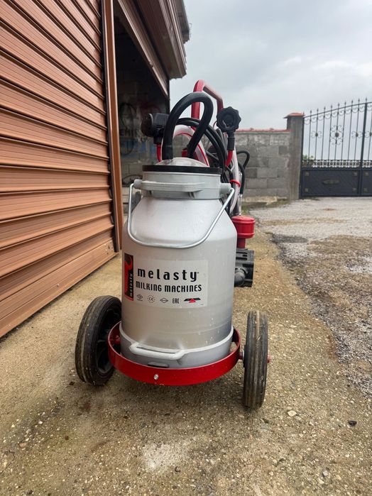Машина за доене за крави