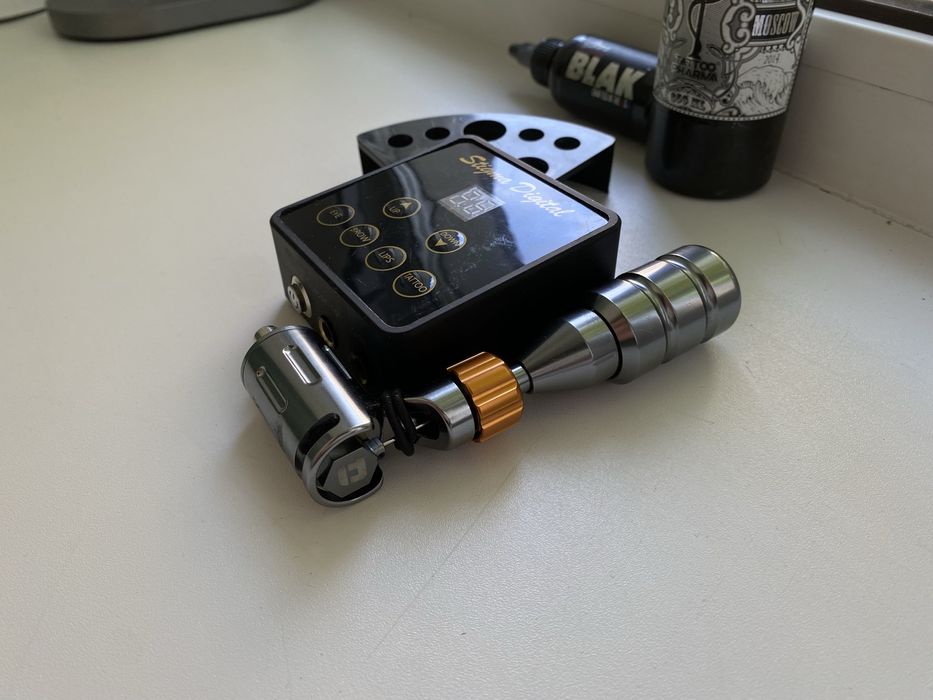 Тату машинка.