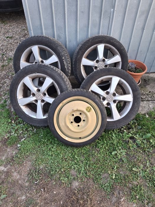 Vand jante aluminiu mazda3 pe 16 cu piulițe si roata rezerva slim .