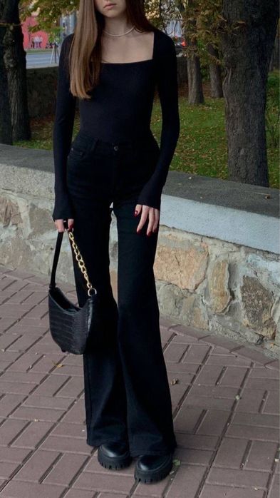 Джинсы черные клещ