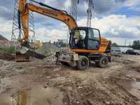 Vând excavator jcb pe pneuri