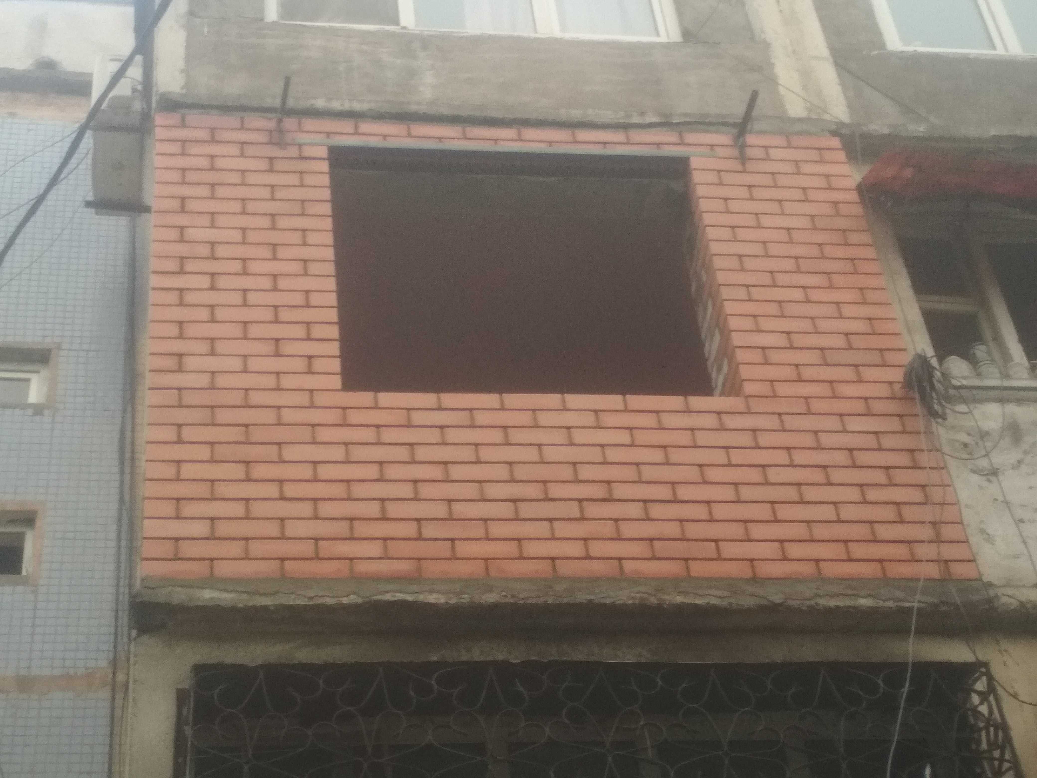Кирпичная кладка балкона