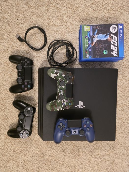 Vând PlayStation 4 Pro + 4 manete + 4 jocu ps4
