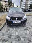 Vand auto berlina Suzuki  SX4 , culoare neagra, fabricatie 2009
