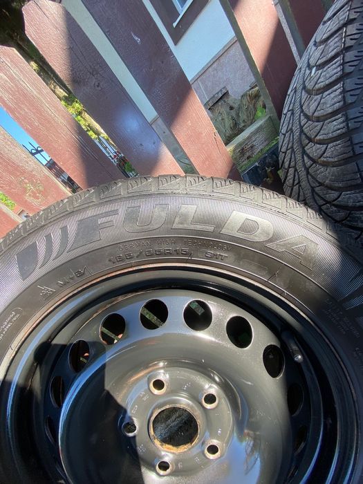 Set 4 cauciucuri iarna Fulda 195/65 R15 cu jante + capace Volkswagen