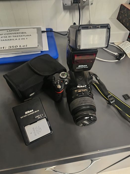 Amanet ozana vinde Nikon D3200 + obiectiv + bliț