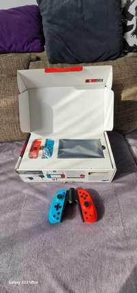 Nintendo Switch complet in cutie + controller extra + 3 jocuri