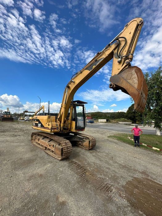 excavator pe senile, marca cat, tip 317bln