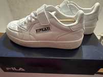 Adidas FILA masura 32. Grad de uzura redus.