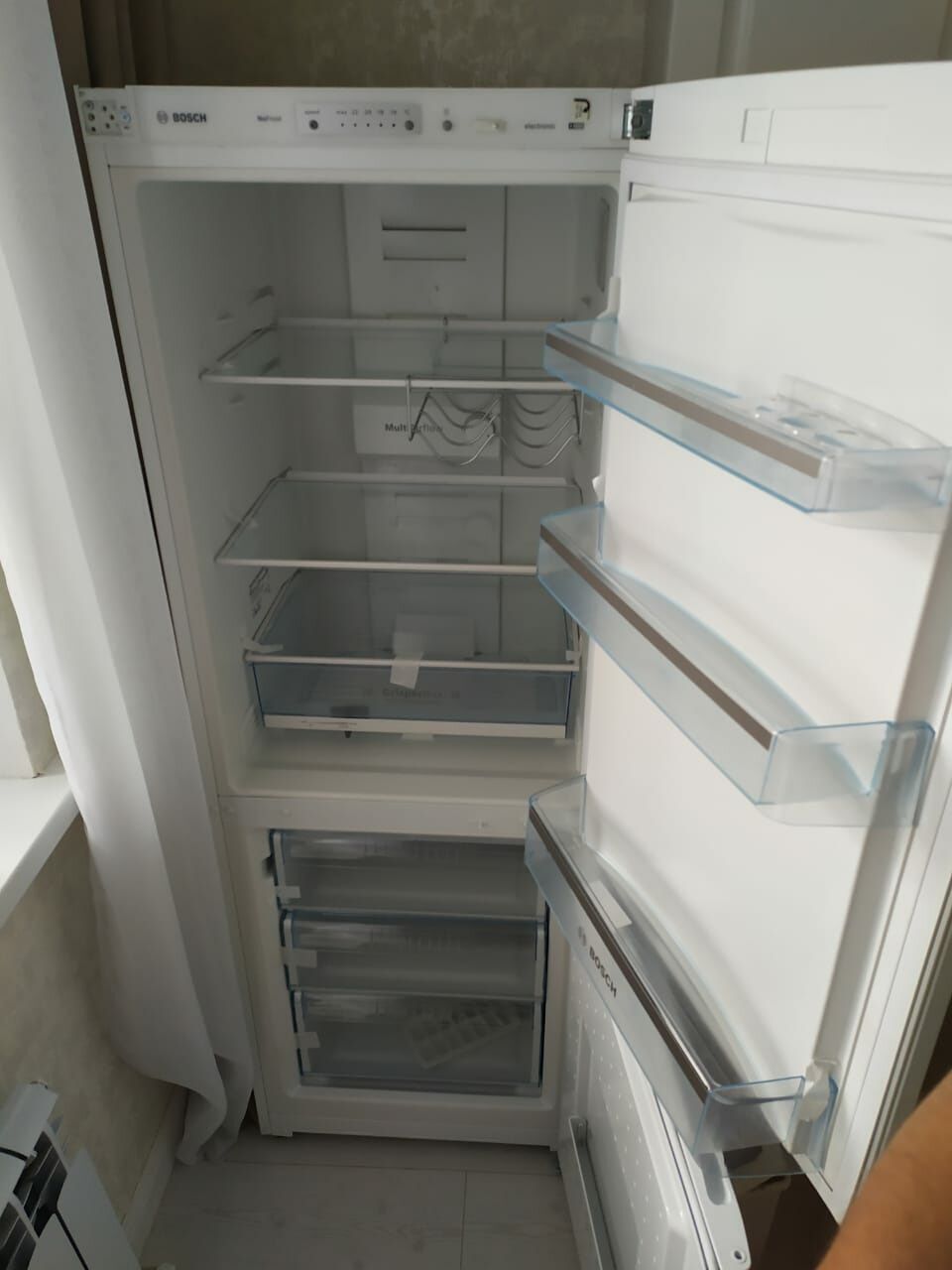 Перенос дверцы холодильника