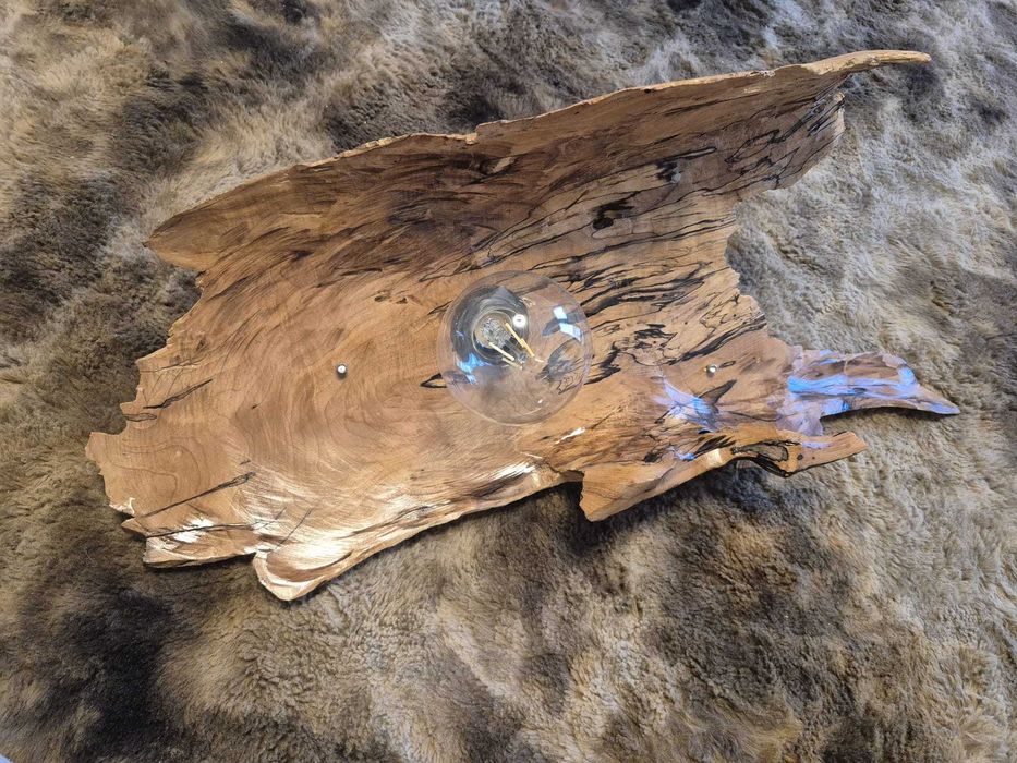 Lustra rustica sculptata manual