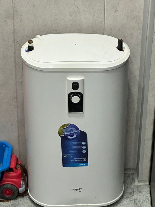 Продам титан 50л Midea