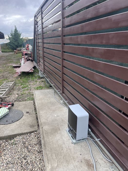 Montaj și automatizări – uși secționale, bariere, sisteme de acces