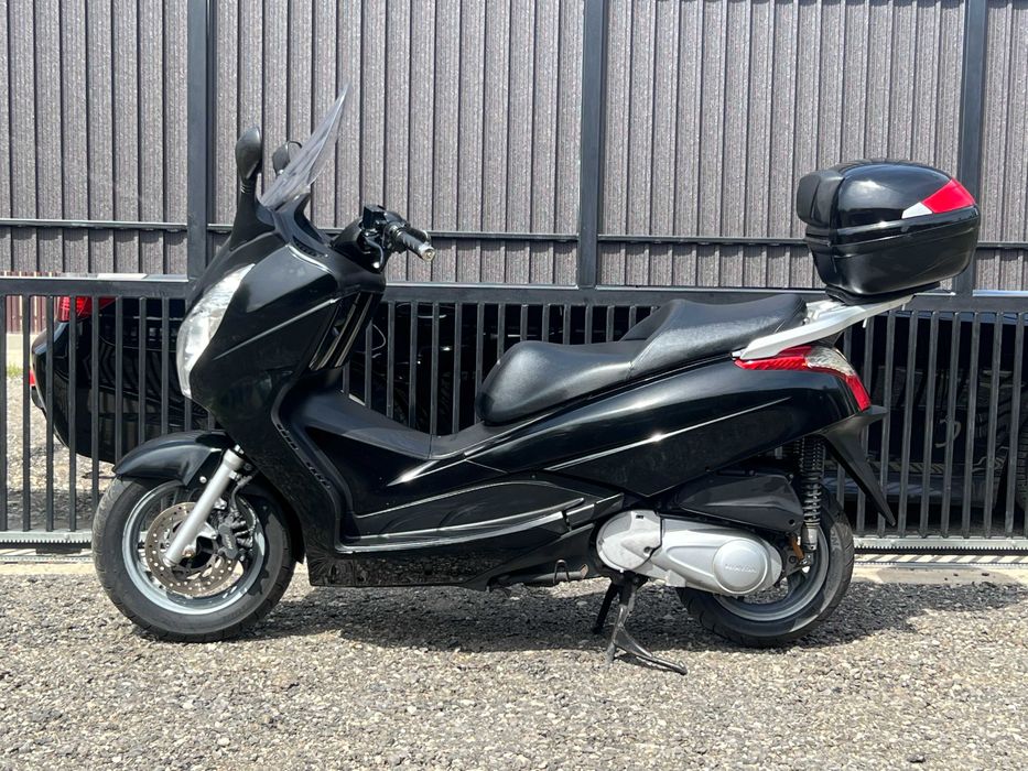 Honda S-wing 125 cc
RATE Fara Avans
