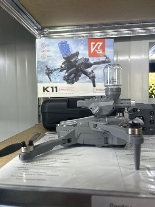 Drona K11 cu impuscaturi