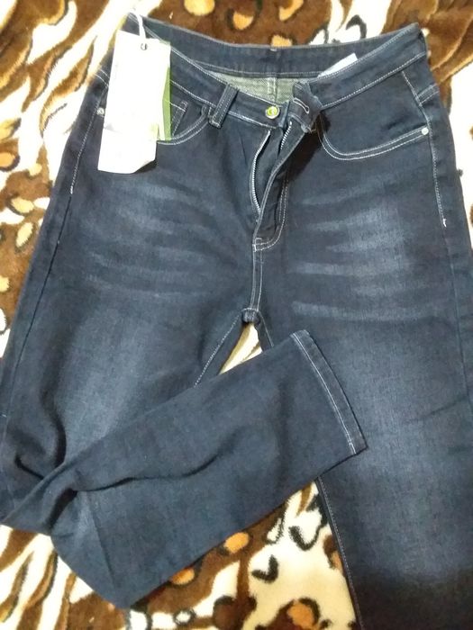 Джинсы новые ,продаю за 100000