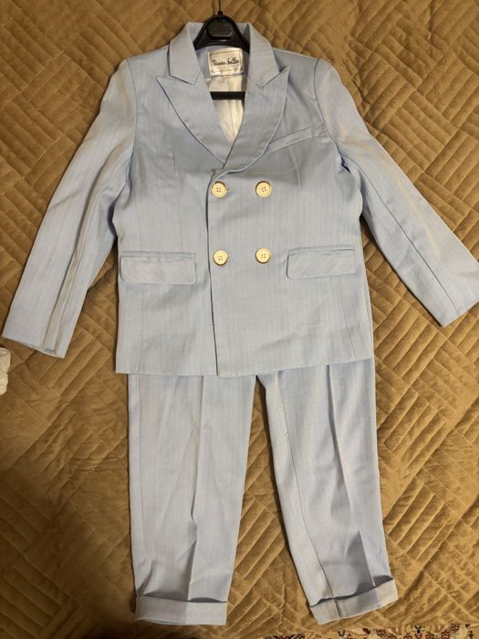 Продам костюм с брюками новый