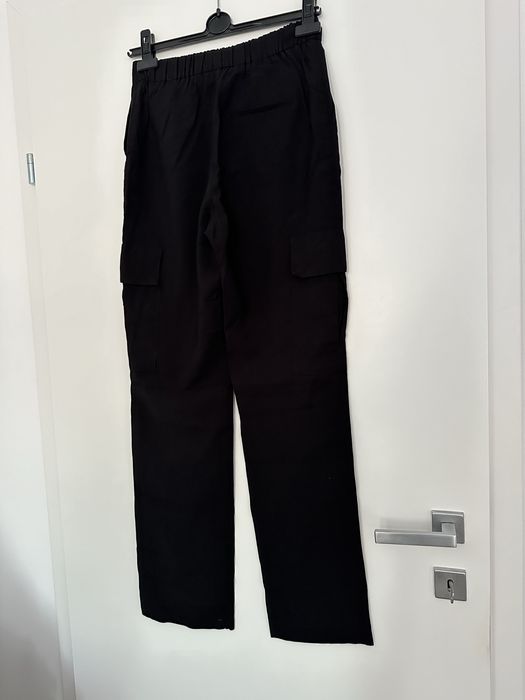 Pantaloni Reserved stil cargo cu buzunare laterale