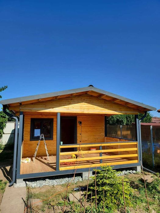 Cabana stil A-Frame, case, terase si foisoare din structura de lemn