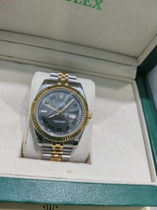 Rolex Механические часы Ролекс
Ремешок железный 
Стекло минеральные 
К