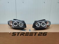 Faruri Angel Eyes BMW Seria 1 E81 E82 E87 E88 (2004-2011) Negru