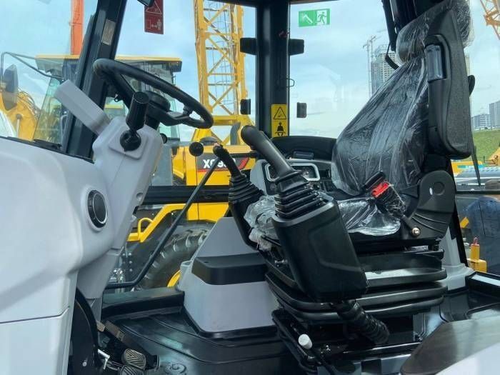 Экскаватор Погрузчик ХСМЖ