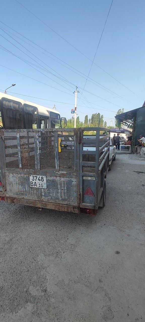 Продаю Волгу 3110 с прицепом