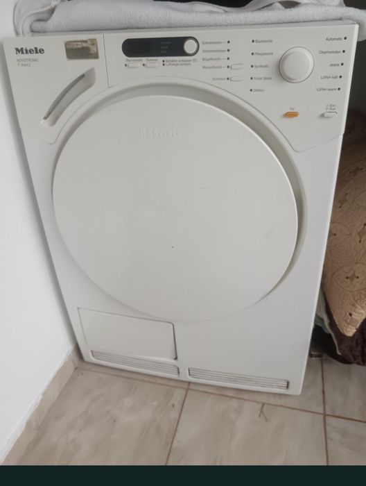 Vând mașina de uscat rufe