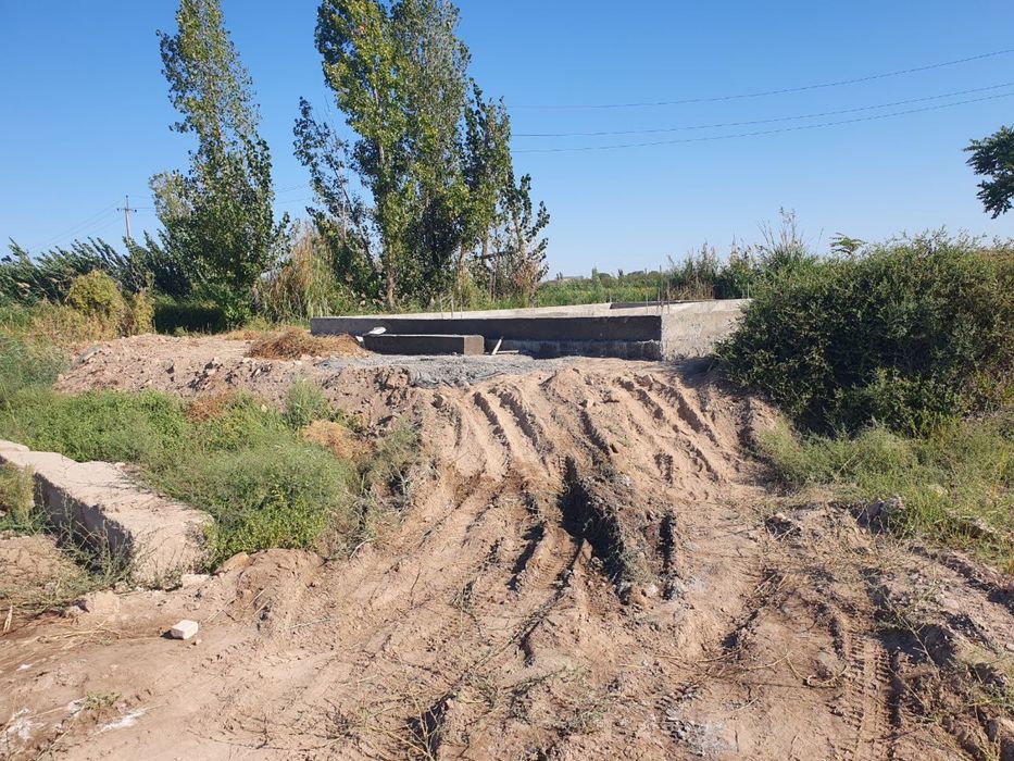 Yangiariq tuman kasalxonasi orqa tomonida noturar 100 kv