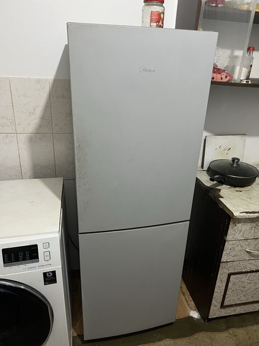 Холодильник новый покупали