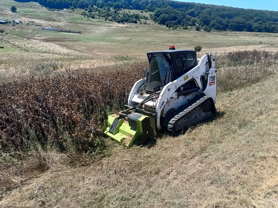 Bobcat senilat cu tocator vegetal - forestier