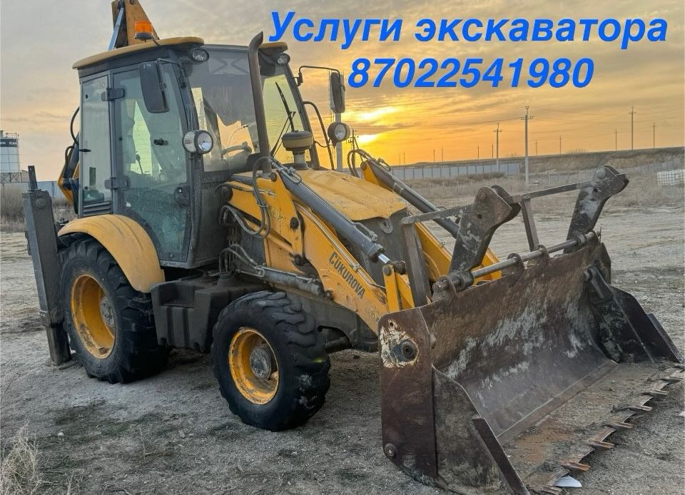 Услуги экскаватора-погрузчика
