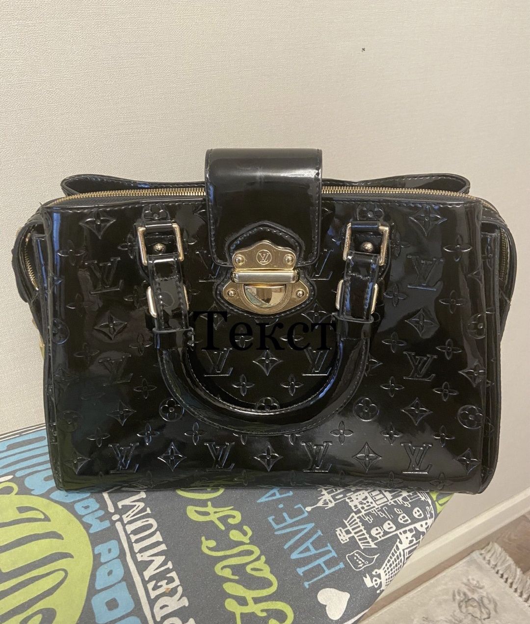 Сумка lv черного цвета лаковая