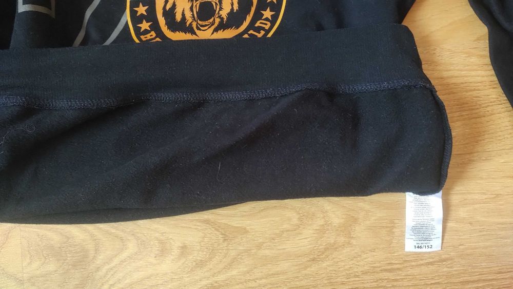 Bluză cu mânecă lungă pentru copii de 10-12 ani.