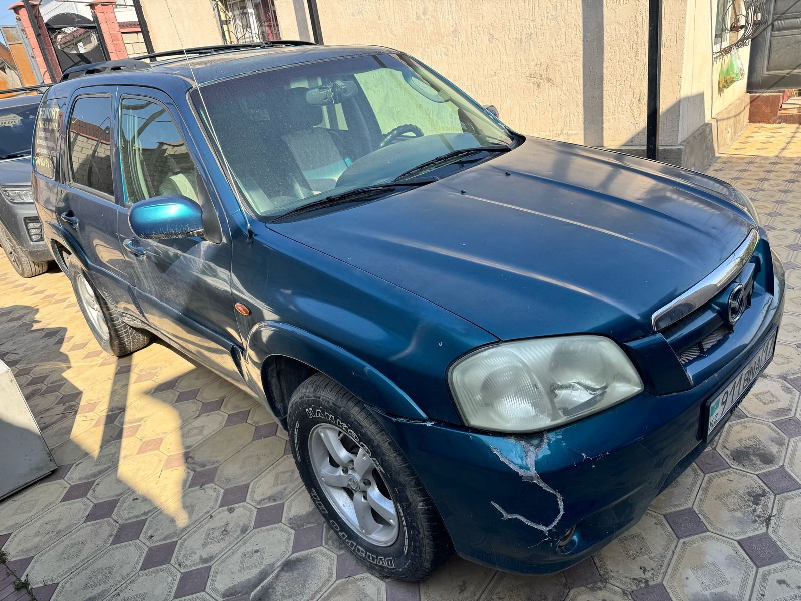 Mazda tribute рестайлинг