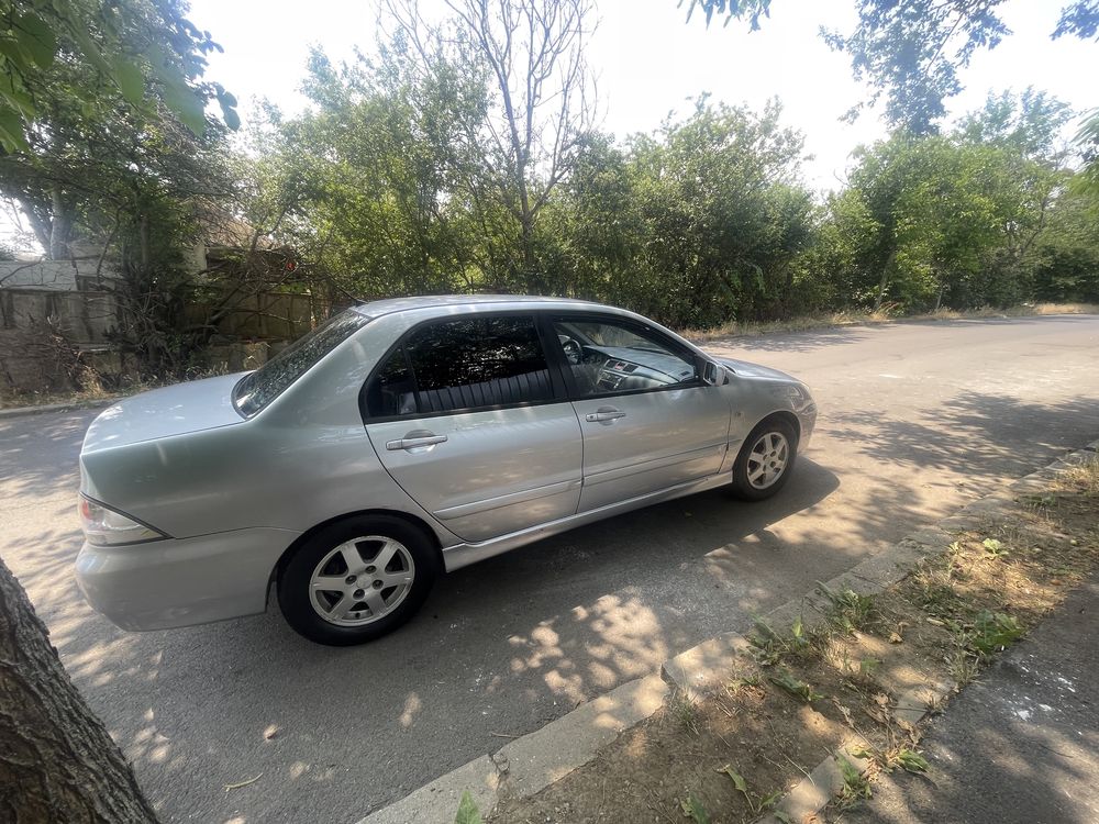 Vand sau schimb Mitubisi Lancer 1.6 benzina cu gpl