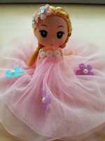 Куколка в розовом платье