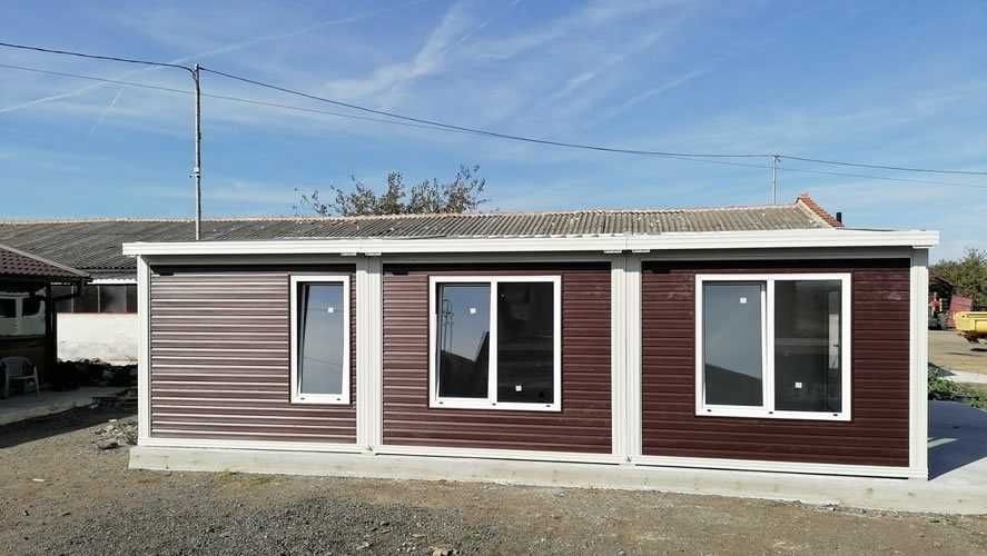 Casa modulara și garaje auto din structura metalica si panou sandwich