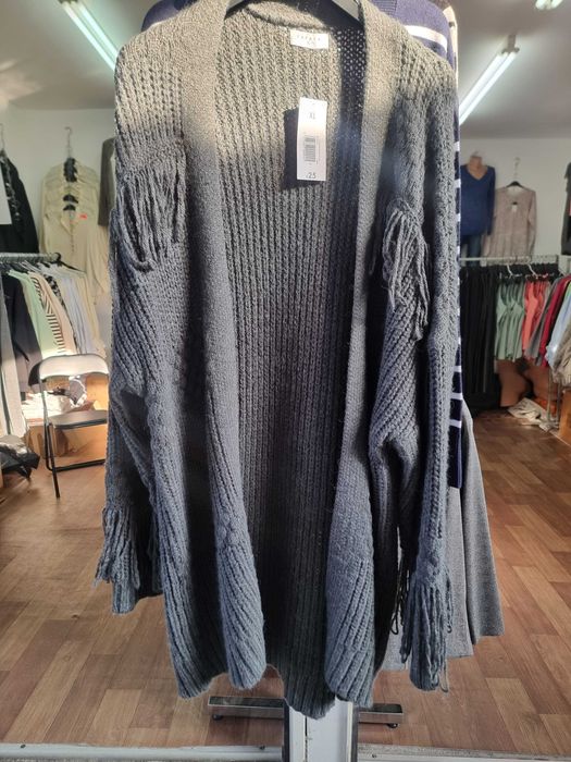 Дамски плетени жилетки