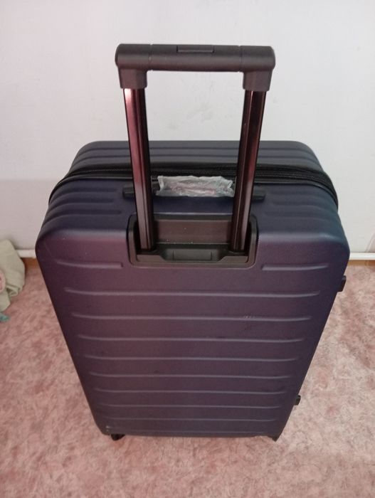 Продам дорожный чемодан новый