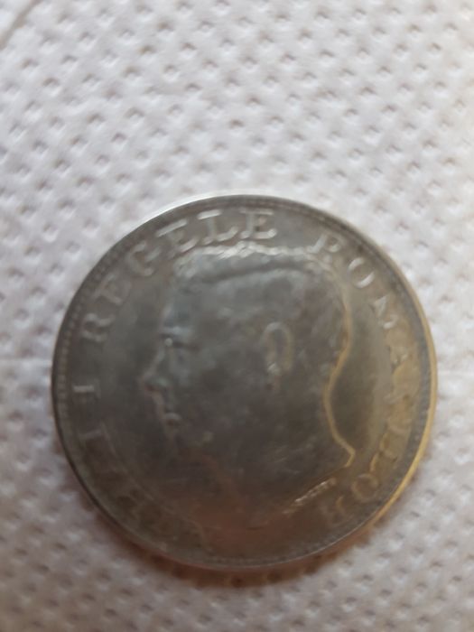 Vând monedă veche din argint