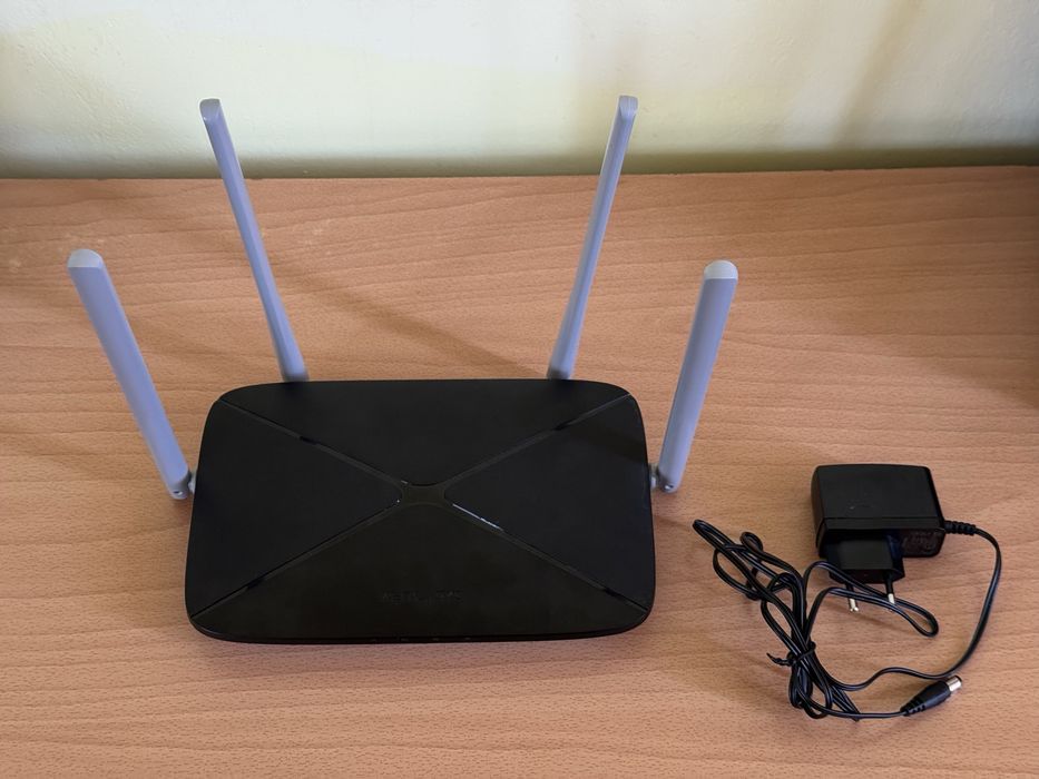 Router Wi-Fi Mercusys AC1200 Dual Band, ușor negociabil.