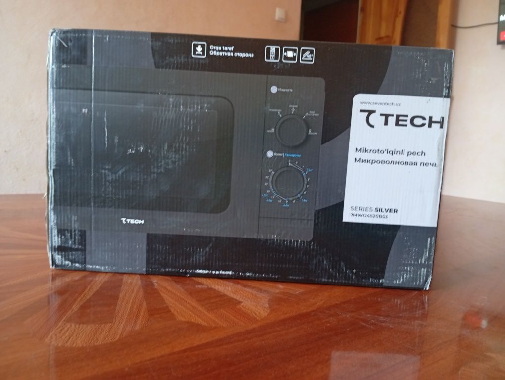 Seven tech mikrovolnovka . Yangi turibdi ochilmagan kelishladi kamibor