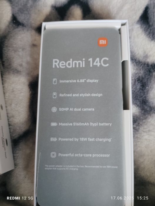 Redmi 14C telefonul este nou in cutie