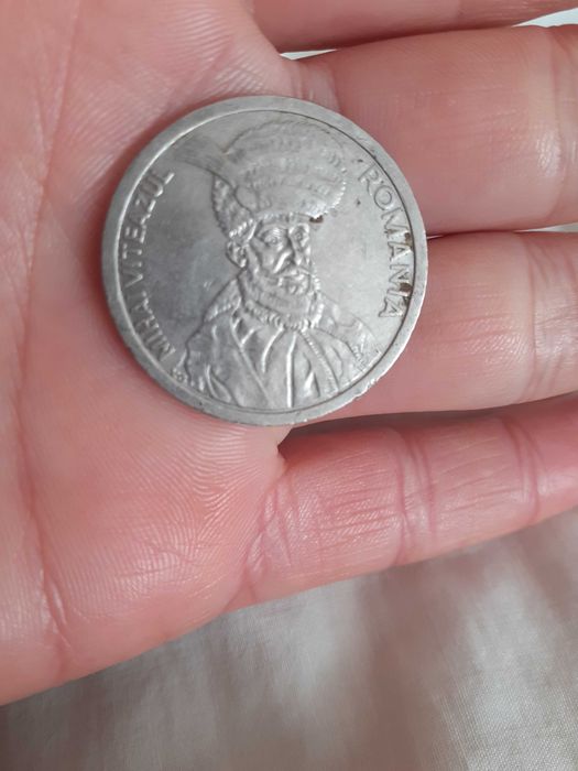 Vand moneda 100 lei