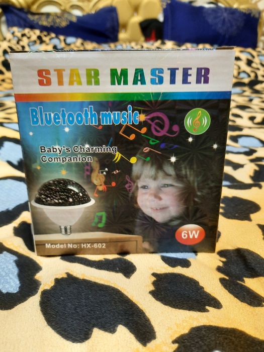 Veioza cu joc de lumini și Bluetooth