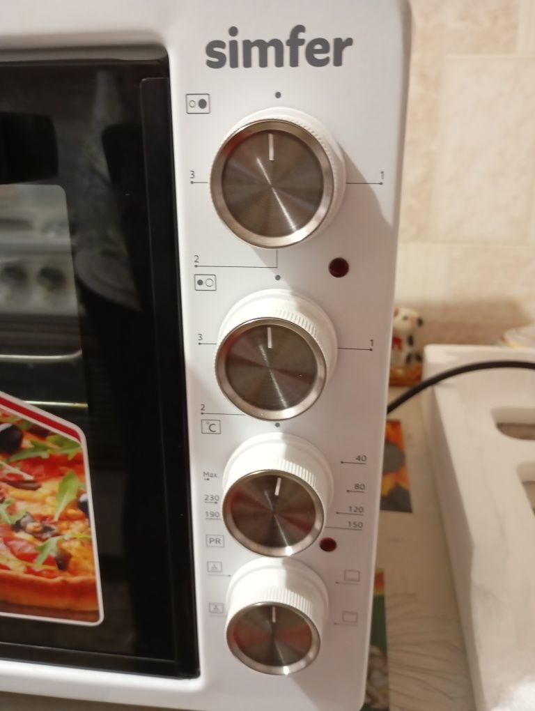Продам электрическую мини печь Simfer