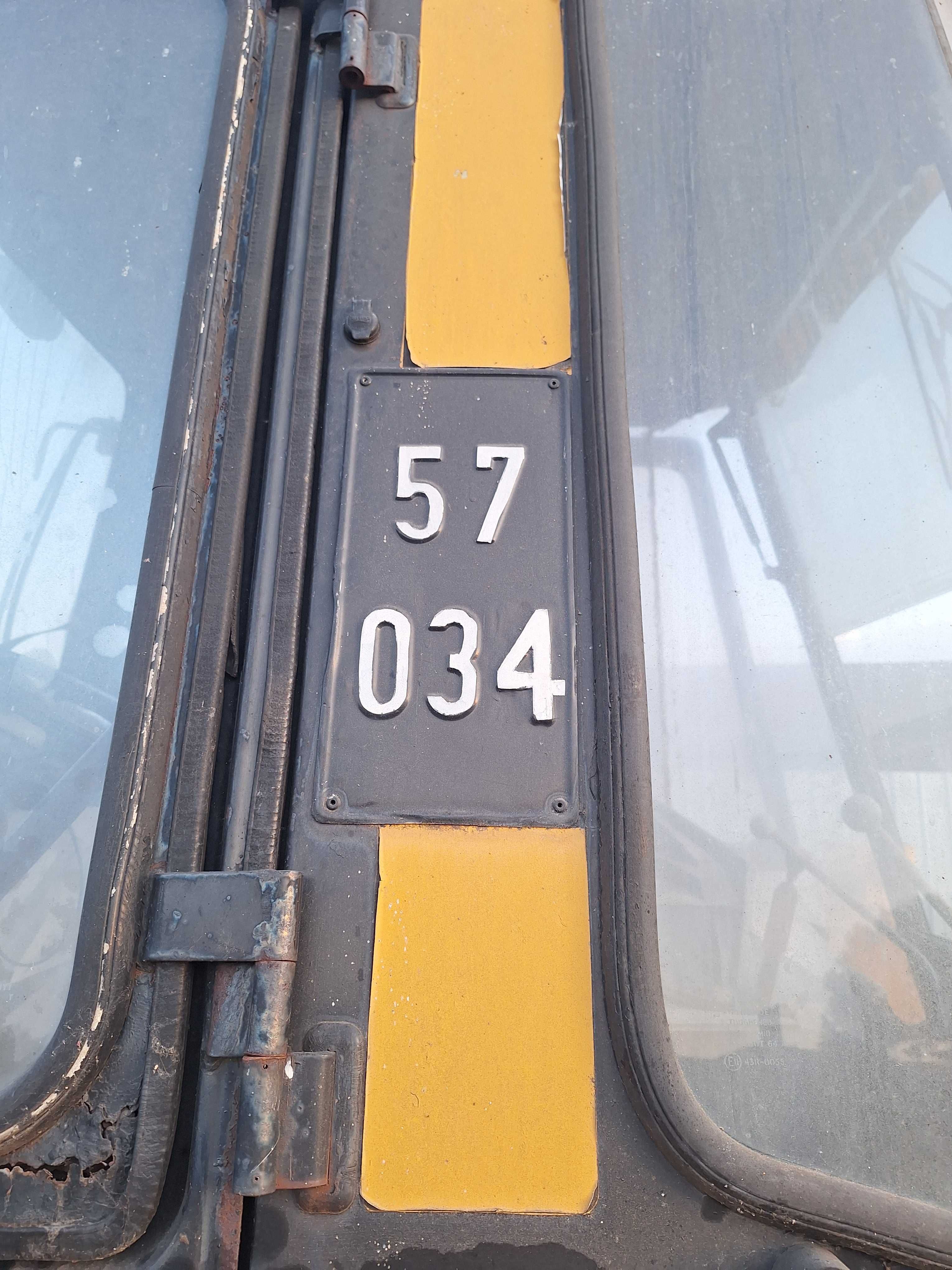 Buldoexcavator  caterpillar